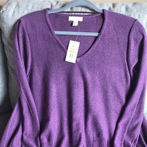 Plum Vneck hi low sharks hem Holiday sweater with plum metallic flecks.
